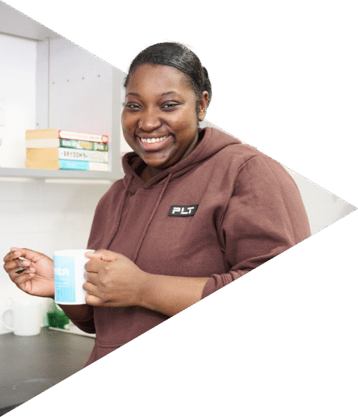 Smiling female drinking a coffee